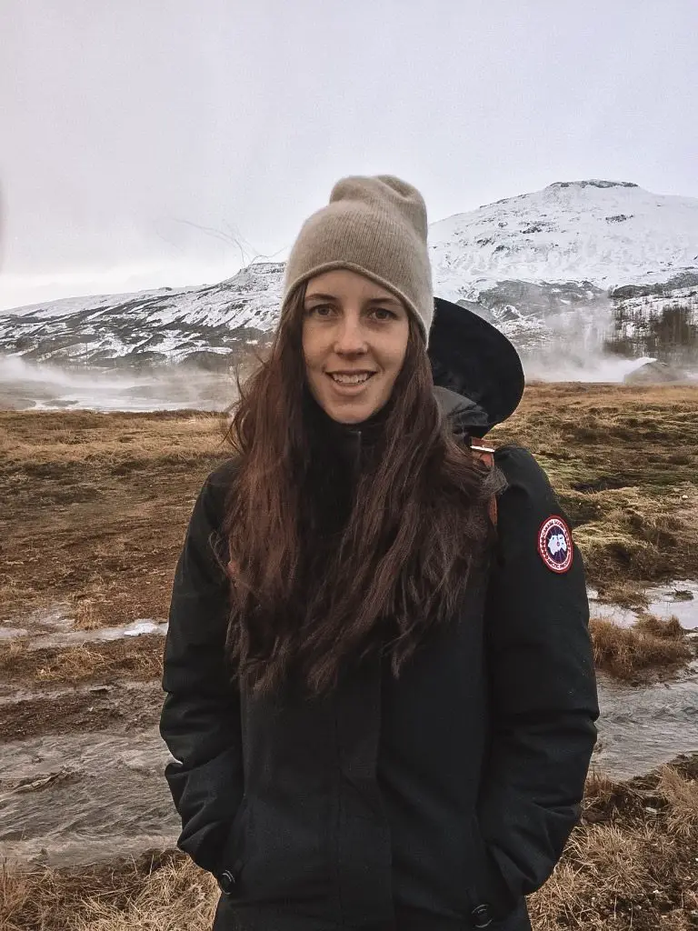 Girl in front of Geysir in Iceland