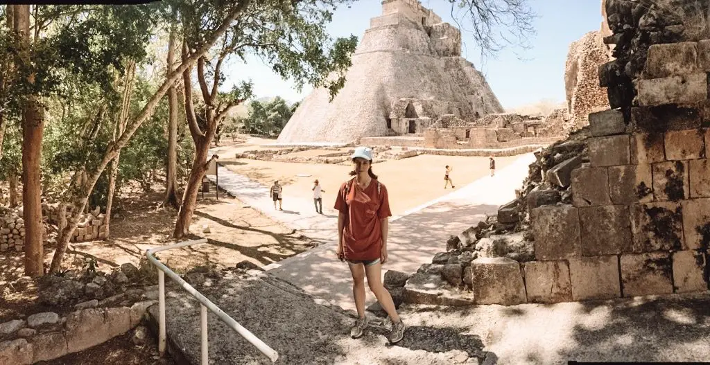 girl in front of ruins in Uxmal Mexico