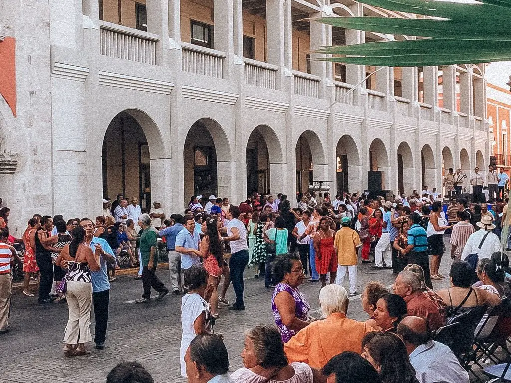 lively street in Merida Mexico dancing