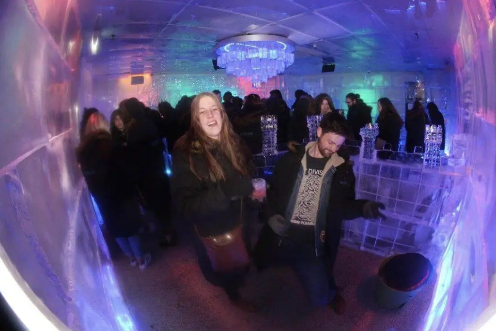 people dancing in ice bar