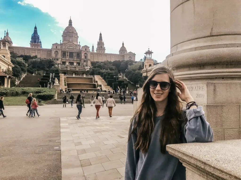 Girl in front of Catalunya Museum in Espanya Square Barcelona