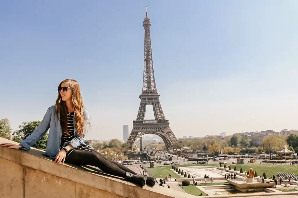 Girl in front of Eiffel Tower Paris