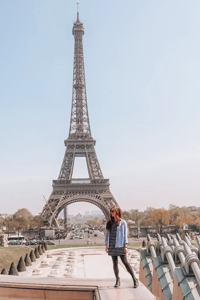 Girl in front of Eiffel Tower Paris