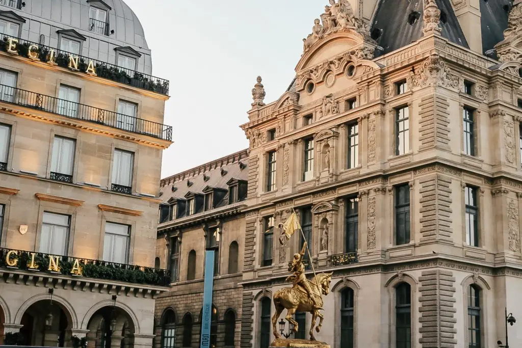 Gold statue and buildings in Paris