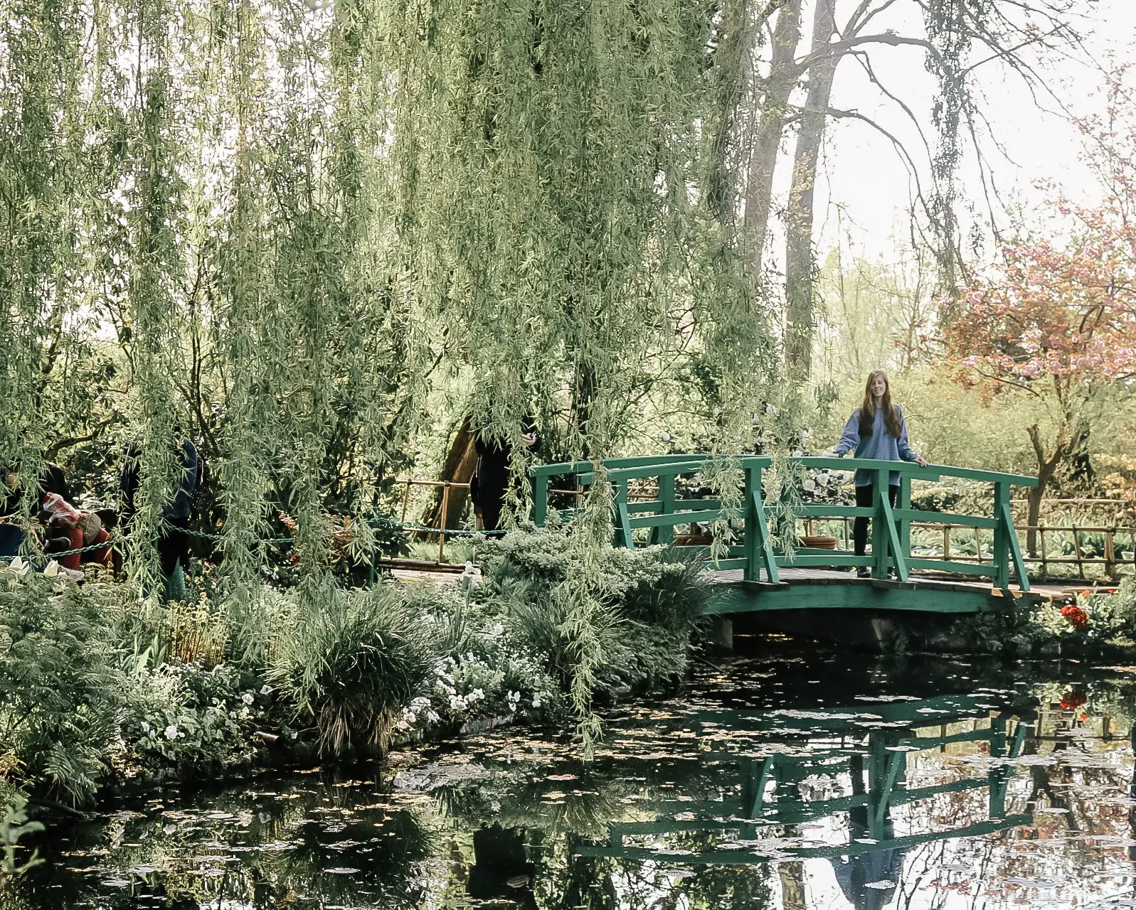 Girl on green bridge at Giverny