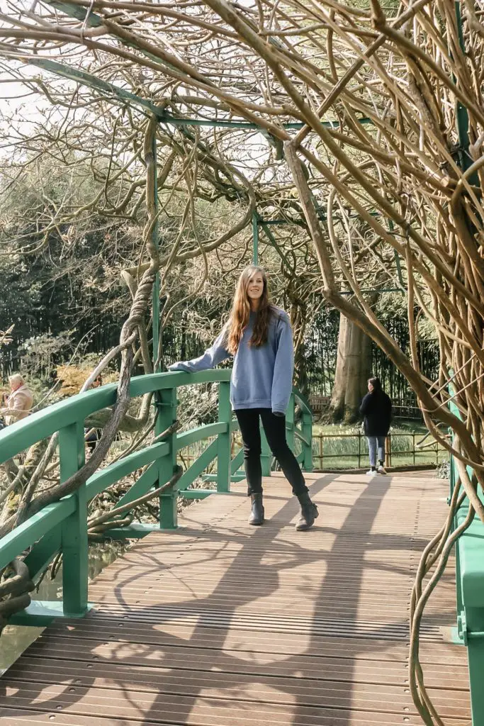Girl on green bridge at Giverny